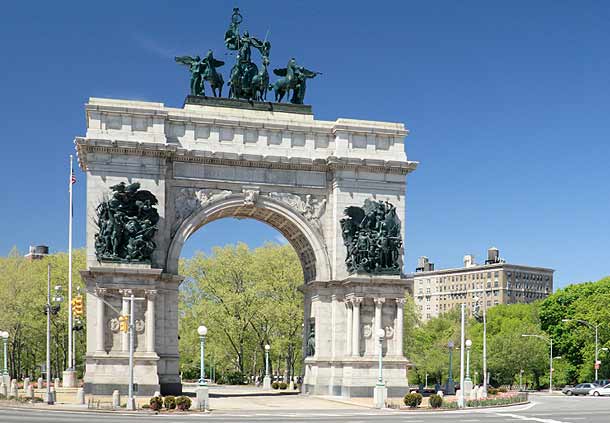 Photo of the Brooklyn Grand Army Plaza Arch next to Prospect Park summer day photo.